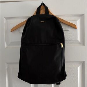 Tumi Black Backpack with Gold Accents